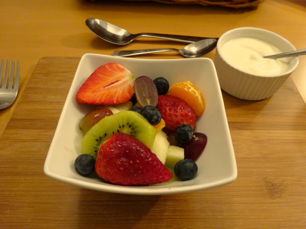 Fresh fruit salad with natural yoghurt